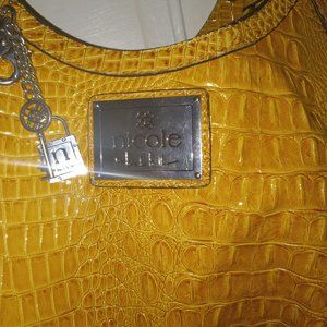 Gold Nicole Miller alligator purse